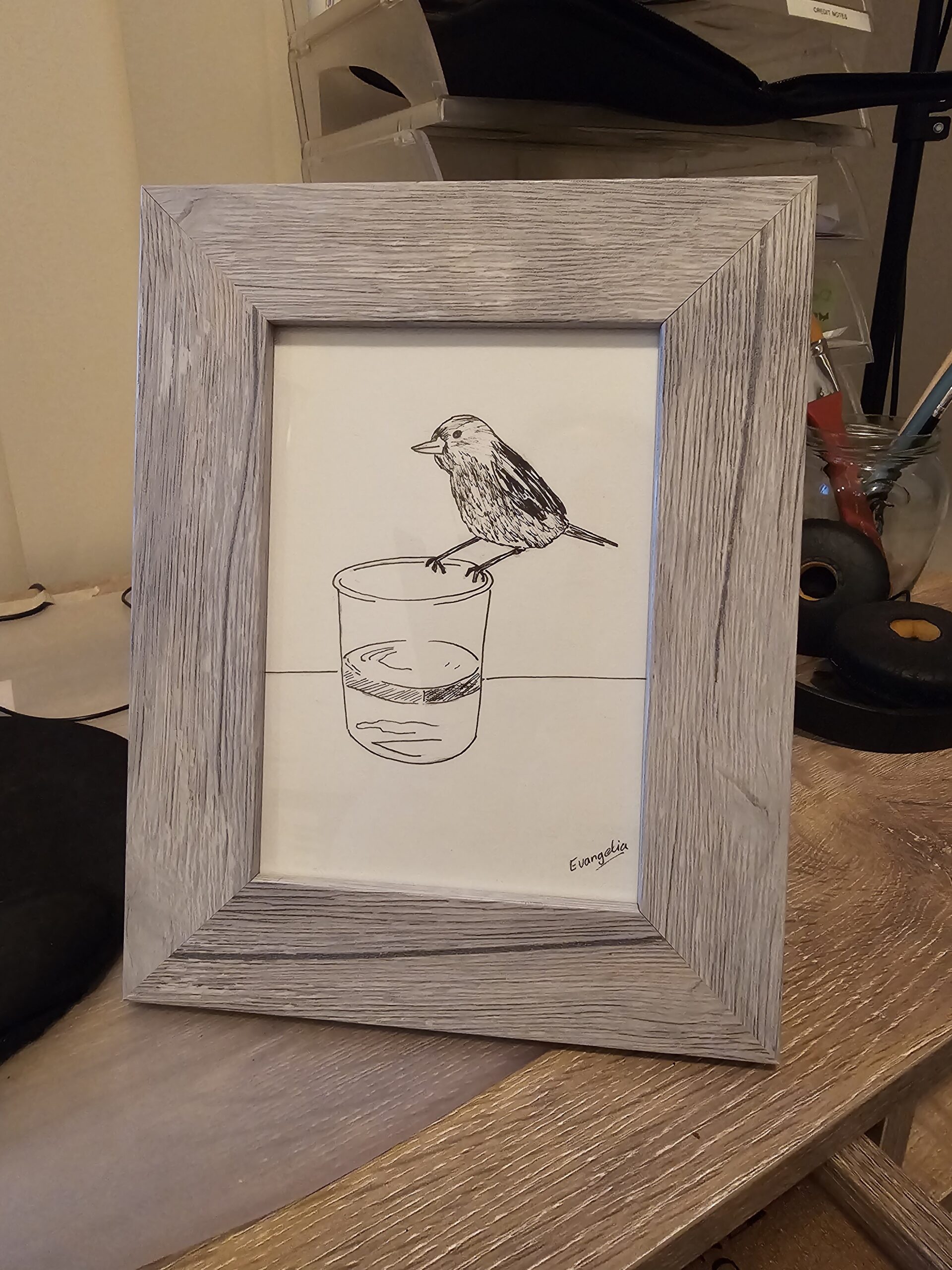 bird on glass in frame